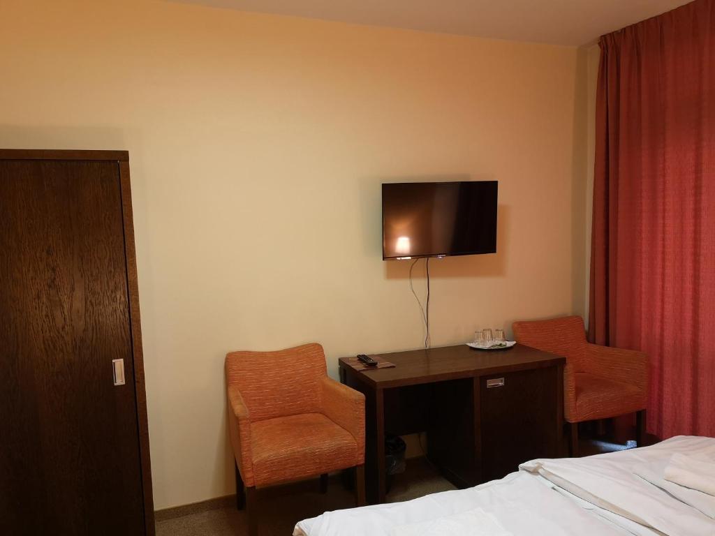 Hotel Cosmopolitan – dvoulůžkový pokoj s klimatizací